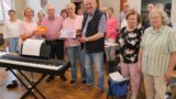 500 Euro für die Tafel: Schütte-Chor verzichtete drei Jahre auf Weihnachtsgeschenke